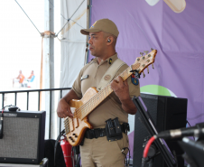 Nem a chuva afastou o público: Banda da PMPR agita o Palco Sunset em Shangri-lá