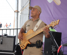 Nem a chuva afastou o público: Banda da PMPR agita o Palco Sunset em Shangri-lá